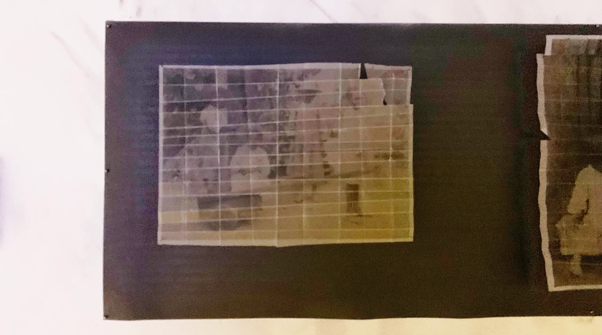 A picture of the back side of a photo taken by an individual.